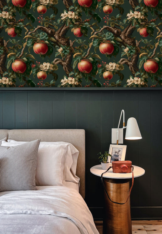 Orchard Bough wallpaper on a wall — Wingback chair by fire scene