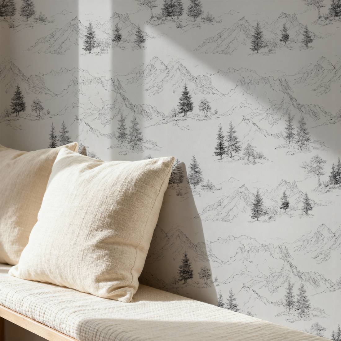 Summit Sketchbook wallpaper in soft grey behind a cushioned daybed